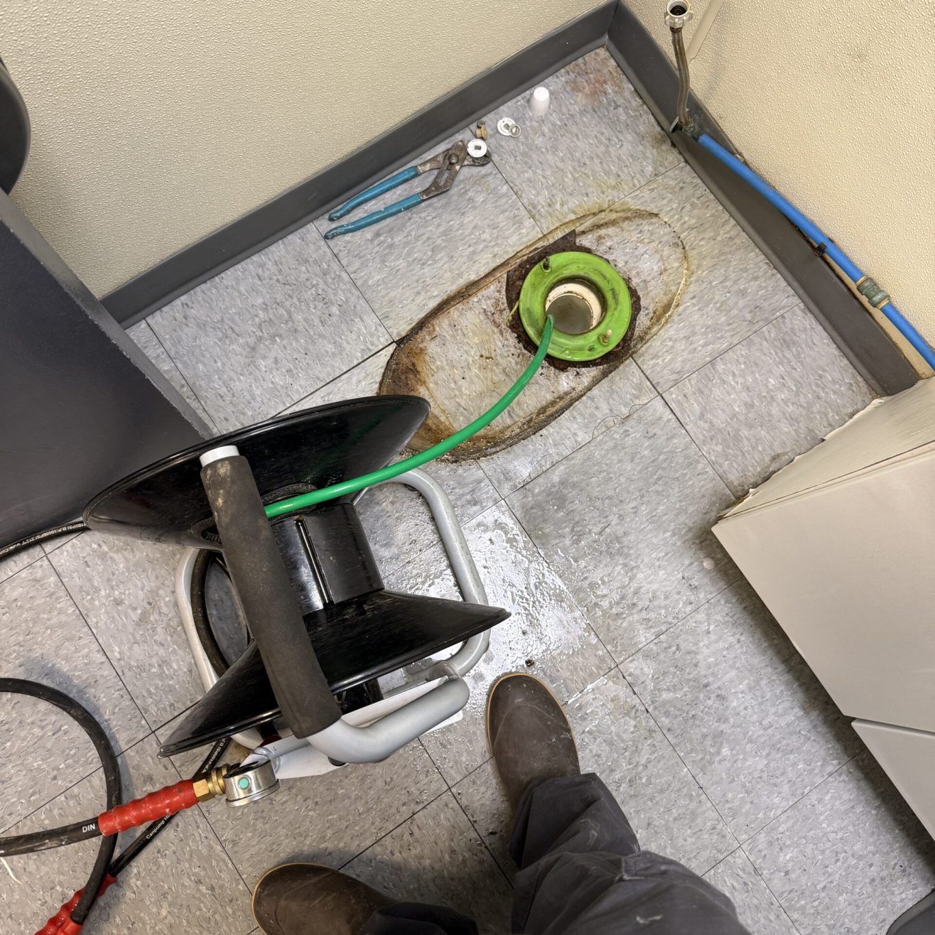 Technician using a video inspection camera to check a residential drain line in Camp Hill, PA