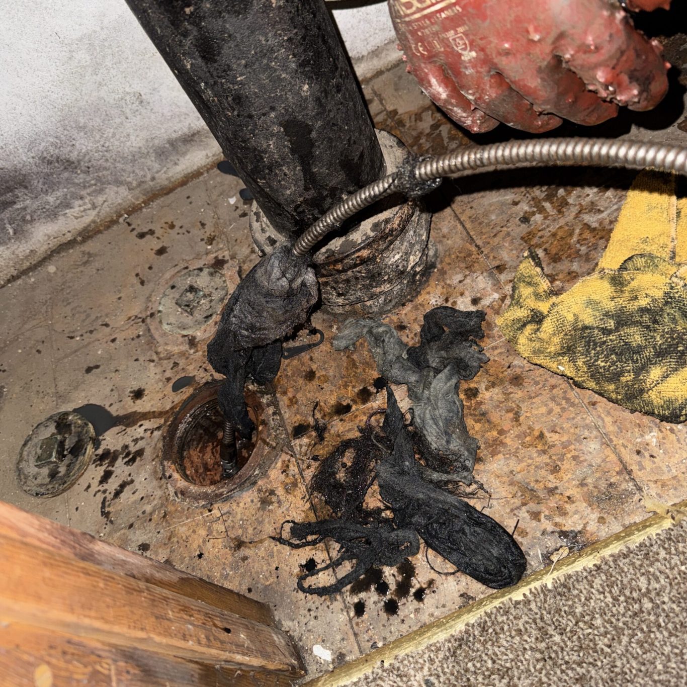 Licensed plumber fixing leaking copper pipes in Carlisle, PA historic home basement