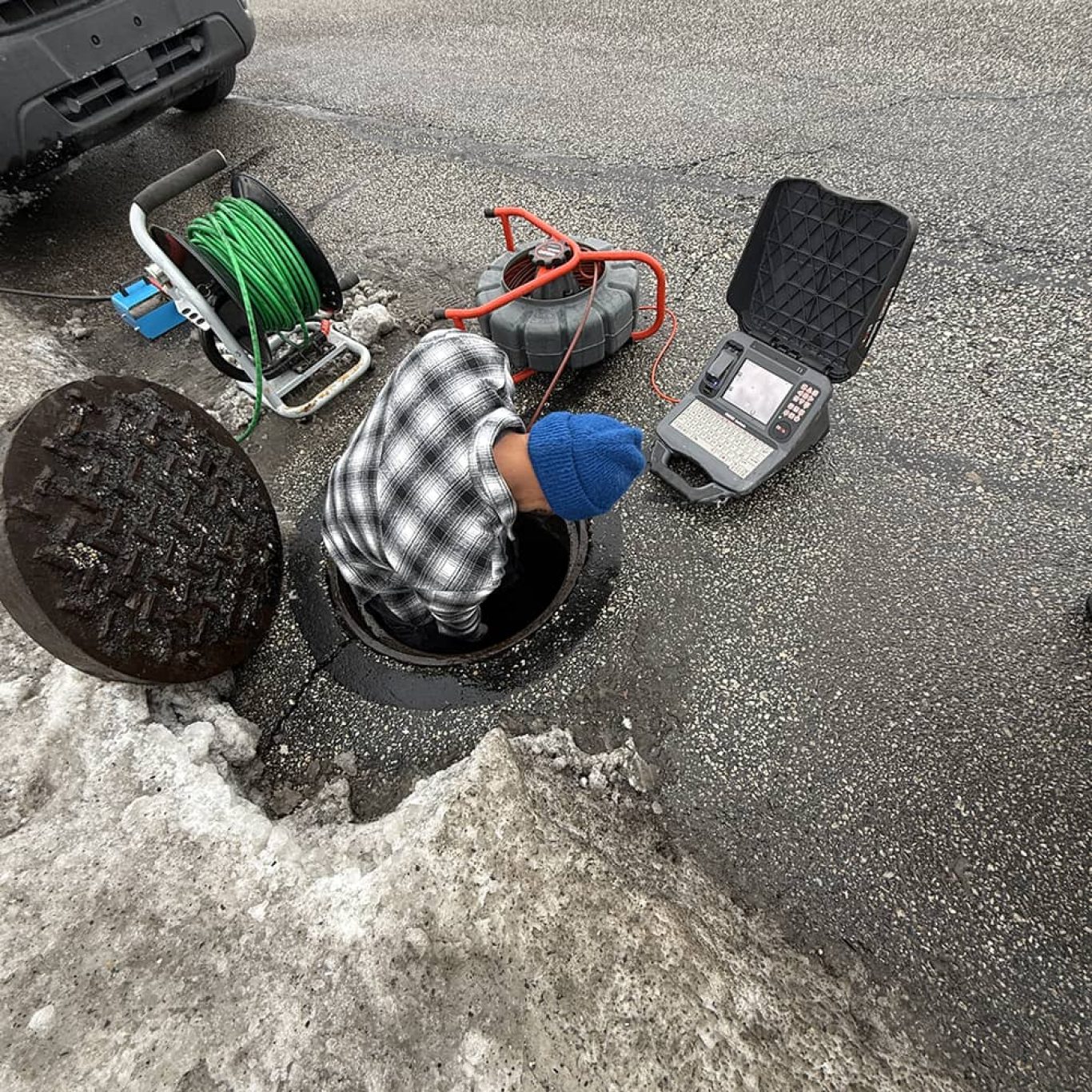 Skilled plumber from JG Plumbing and Drain Cleaning repairing water lines in a Colonial Park, PA apartment complex utility room