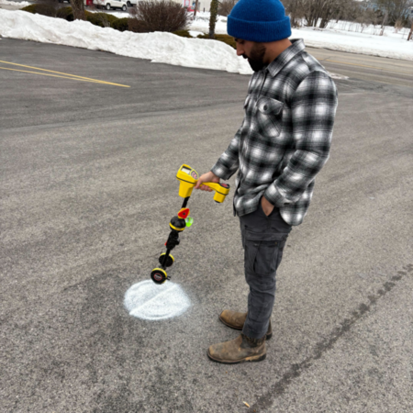 Experienced team clearing storm drains and inspecting water flow on a residential Paxtonia, PA street